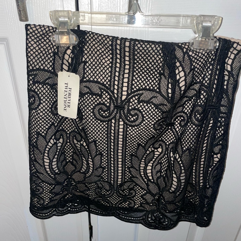 Black lace mini skirt